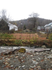 looking across the river at put to bed garden
